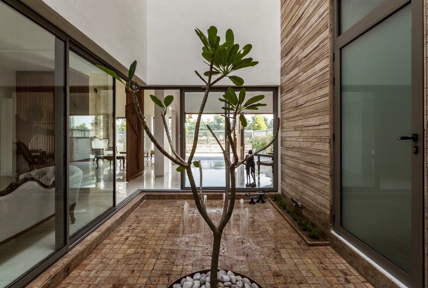  House  Around a Central  Courtyard  Charged Voids The 