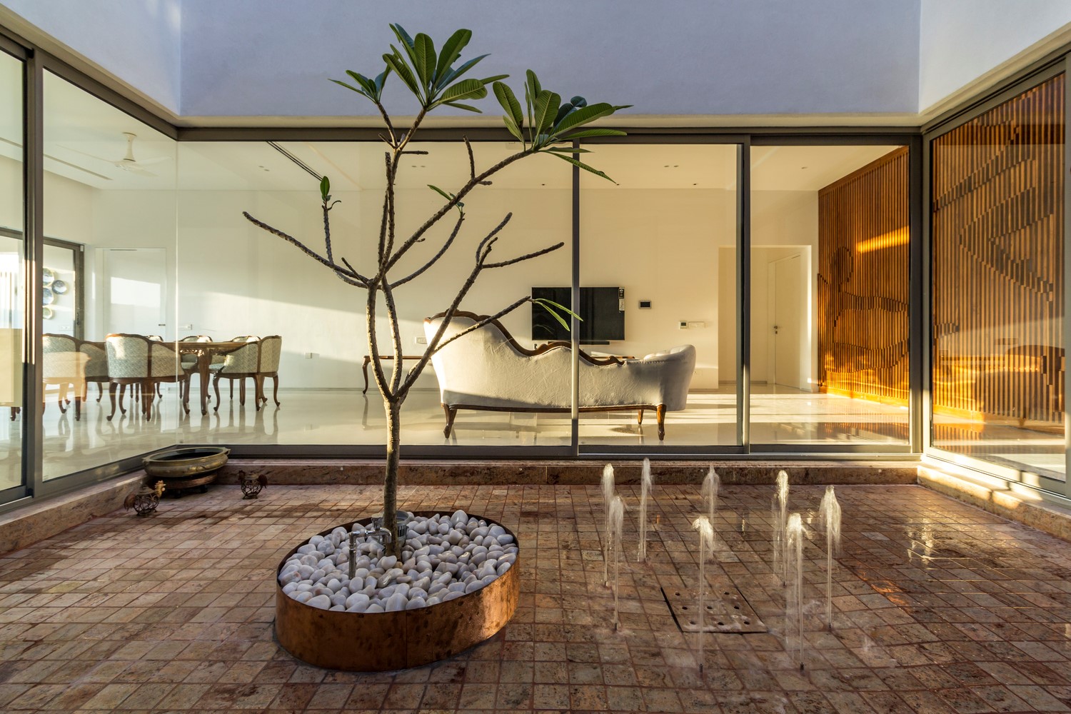 House Around a Central Courtyard Charged Voids The 