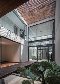 Double-Height Courtyard Providing Experiential Environment At RR House ...