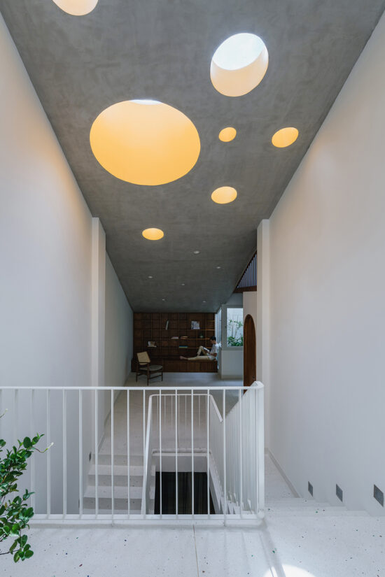 Connecting Spaces of this Tube House has Sky-Lights that Connects its ...
