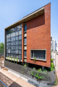 Exposed Brick and RCC creating Compositional Structure of the Residence ...