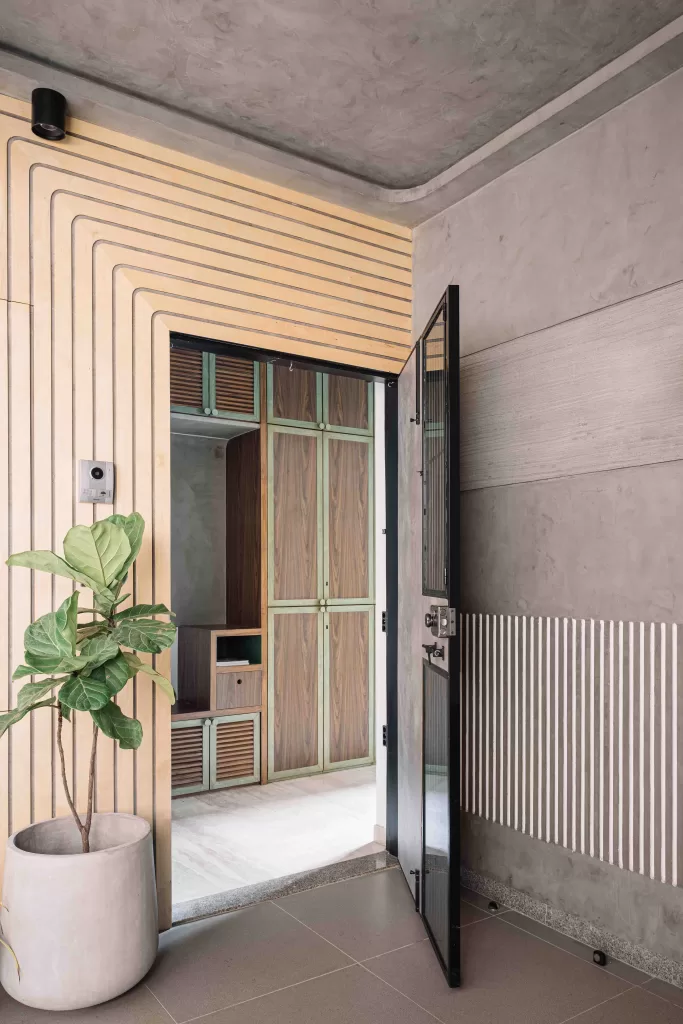 Entrance door with grey microtopped walls and ceilings 