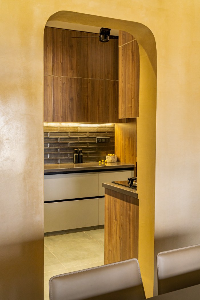 The Interior Of This Modern Indian House Design Has A Warm Earthy ...