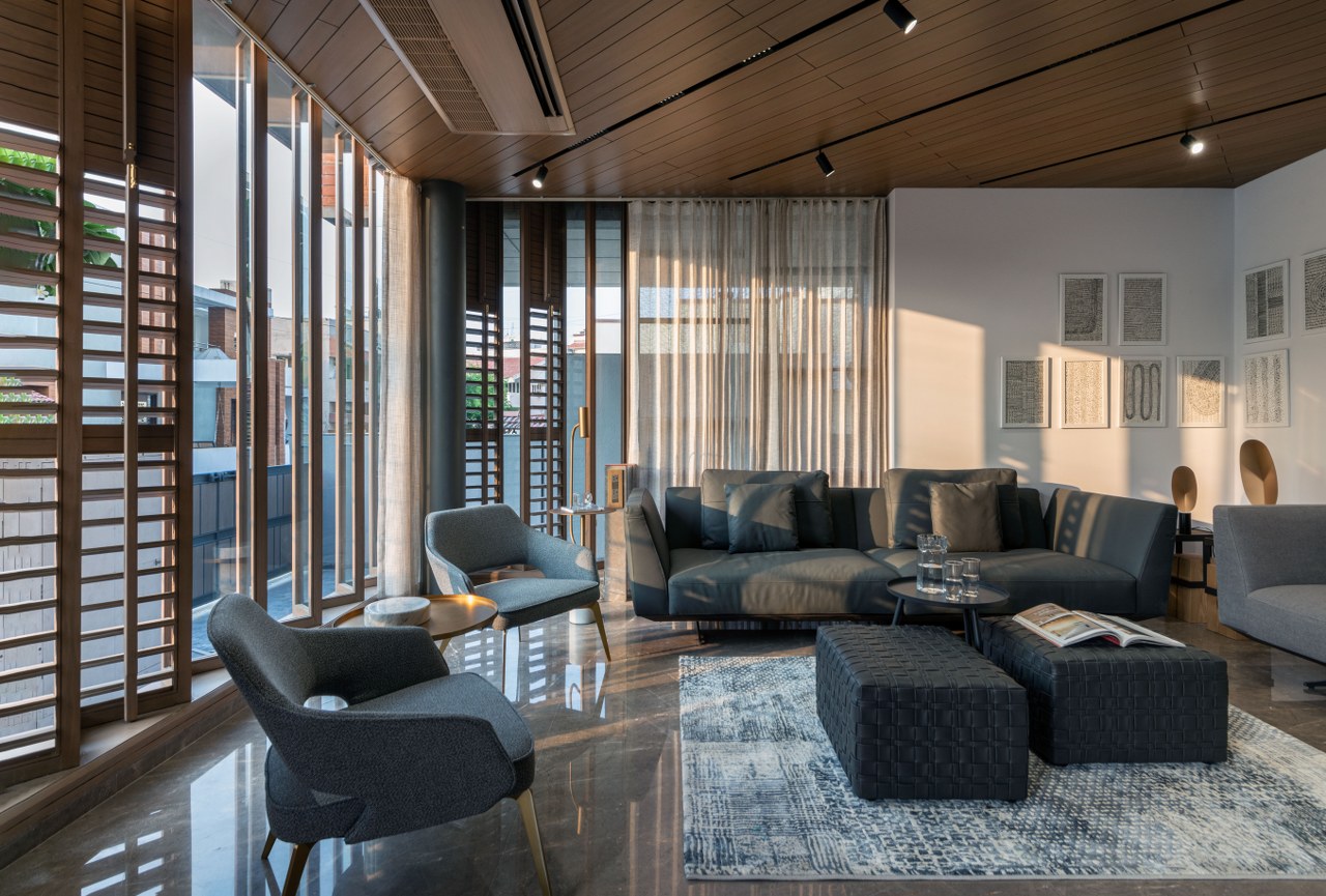 The Residence Features An Exposed Brick Design That Enhances Its Street ...