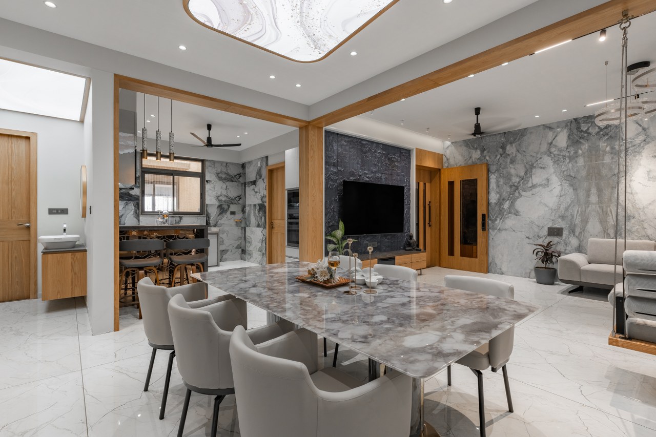 This 4BHK House Design Balances Clean Interiors and Material ...