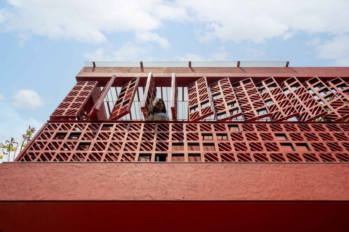A Red Terracotta Facade Stands Out For Its Raw Yet Sophisticated Nature ...